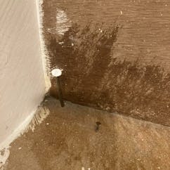 Nail poking out of stair step KCC